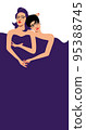 Two girl friends or couple under a blanket having fun 95388745