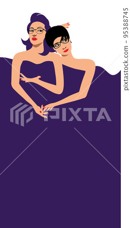 Two girl friends or couple under a blanket having fun 95388745