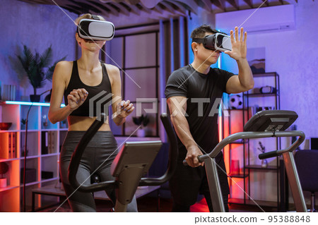 Cardio training, exercise machines, exercising legs, cardio workout indoors, 3D reality concept 95388848