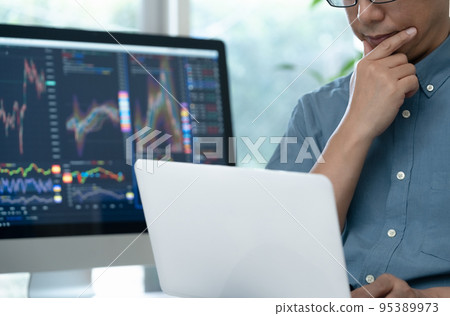 Middle man trading stocks at home Middle man trading stocks at home 95389973