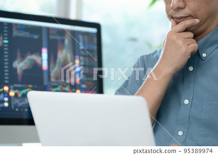 Middle man trading stocks at home Middle man trading stocks at home 95389974