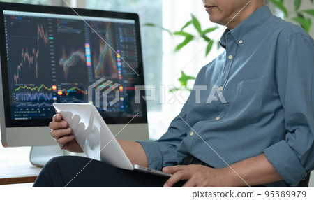 Middle man trading stocks at home Middle man trading stocks at home 95389979