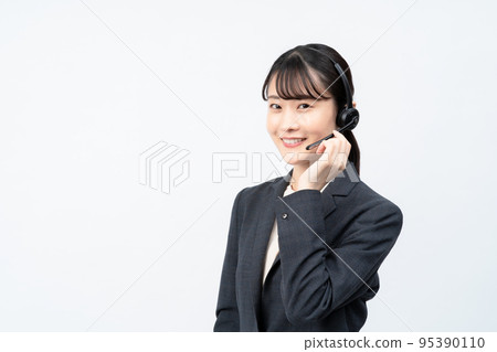 Female operator wearing a headset (white background) 95390110