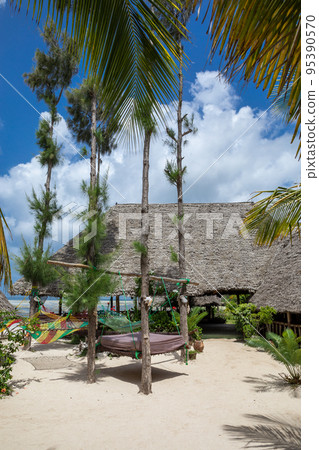 Paradise place. Beach holidays in a chic Asian-style hotel. Wooden beds 95390570