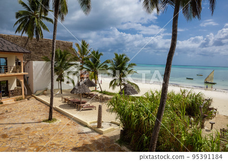 Beautiful beach. Beach furniture on the beach. Paradise vacation.  95391184