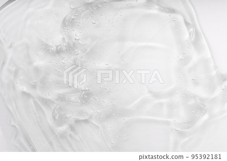 Cosmetic cream transparent liquid gel. Transparent gel smudge on white background. Skincare lotion face serum swatch. Body care. Hyaluron acid for skin care with collagen Cosmetic cream transparent liquid gel. Transparent gel smudge on white background. Skincare lotion face serum swatch. Body care. Hyaluron acid for skin care with collagen 95392181
