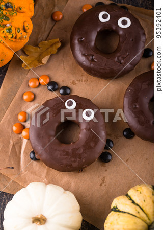 Halloween festive donuts with eyes. 95392401