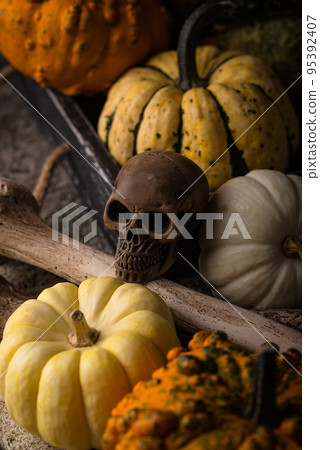 Halloween still life with pumpkin and skull Halloween still life with pumpkin and skull 95392407