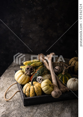 Halloween still life with pumpkin and skull Halloween still life with pumpkin and skull 95392524