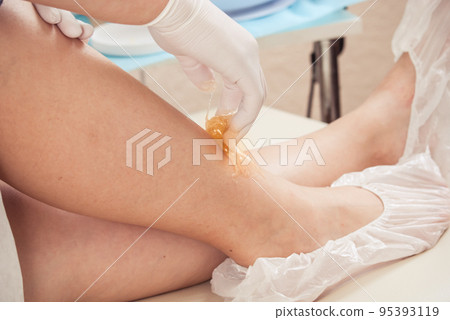 sugaring wax at a professional cosmetologist 95393119