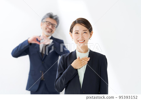 Business person in a suit White background Business person in a suit White background 95393152