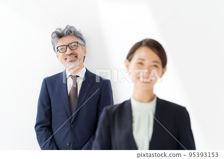 Business person in a suit White background Business person in a suit White background 95393153