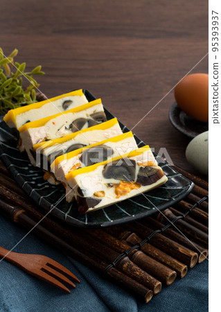 Delicious steamed three color egg made by salted egg, pidan, and chicken egg. 95393937
