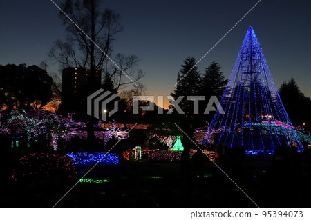 Night park with shining illuminations Night park with shining illuminations 95394073