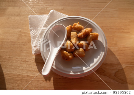 Several pieces of sashimi were placed on a plate 95395502