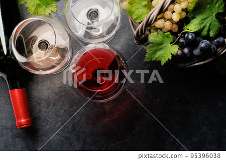 White, rose and red wine glasses and grape White, rose and red wine glasses and grape 95396038