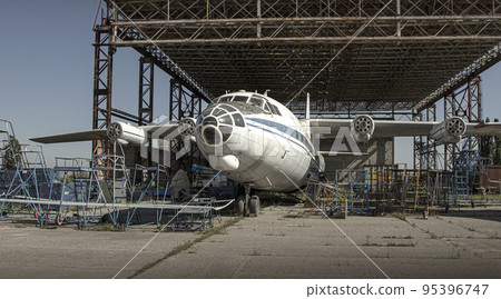 an old plane on the ground 95396747