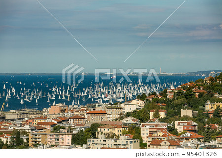 Trieste, Italy. Over 2000 of sails boat in the Adriatic sea during the Barcolana regatta 2017. The Biggest sail boat regata in the world. Trieste, Italy. Over 2000 of sails boat in the Adriatic sea during the Barcolana regatta 2017. The Biggest sail boat regata in the world. 95401326
