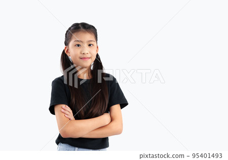 Little asian girl student in casual posing arm cross body on white background... 95401493