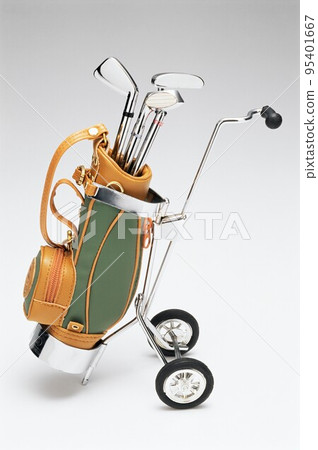 Golf clubs in bag on trolley 95401667