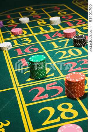 Chips on a roulette table 95401760