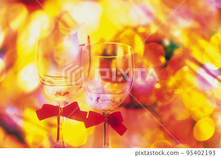 Glasses of wine with red ribbon Glasses of wine with red ribbon 95402193