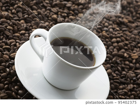 coffee beans and white hot cup coffee beans and white hot cup 95402375