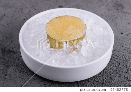 Pike caviar on ice close up 95402778