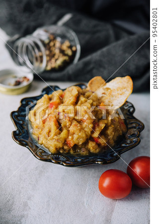 Eggplant caviar in a glass plate Eggplant caviar in a glass plate 95402801