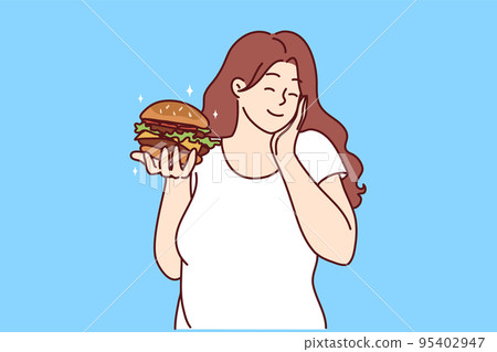 Smiling overweight woman with burger  95402947