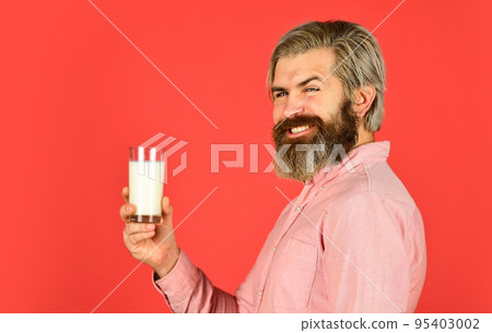 healthy beverage. Useful properties of milk soup. glass of fresh frothy milk. Nutritious protein cocktail in glass. milk for quenching thirst and for taking lot of useful vitamins 95403002