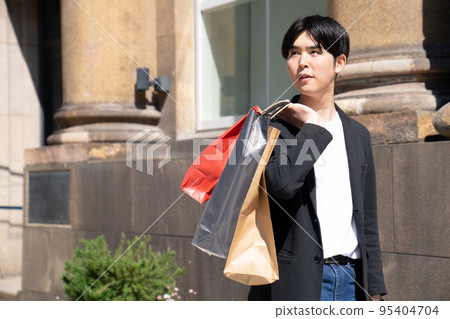 Young man shopping in Kobe Young man shopping in Kobe 95404704