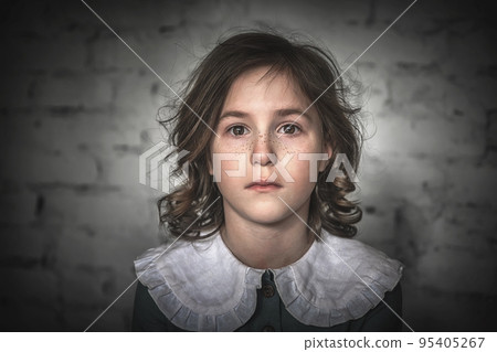 portrait of a sad little girl. loneliness, fear, tears 95405267