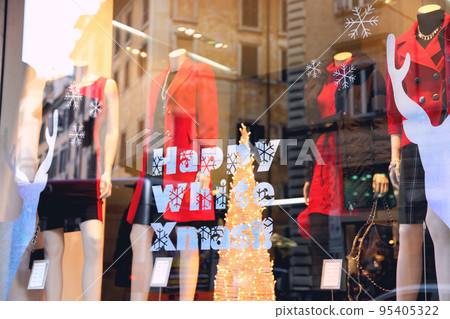 Merry Christmas in rome boutique shop window 95405322