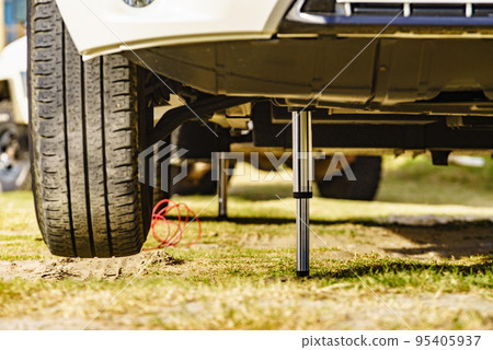 Camper leveling support leg in use. 95405937