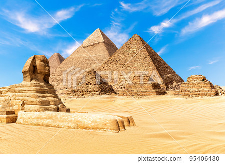 The Sphinx by the Pyramids of Giza in the desert of Egypt 95406480