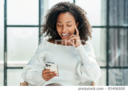 business woman looking at the screen of her smartphone. business woman looking at the screen of her smartphone. 95406808