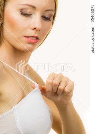 Woman wearing too big bra Woman wearing too big bra 95406873