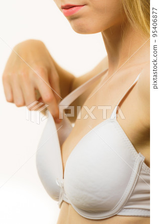 Female wearing too big bra Female wearing too big bra 95406877
