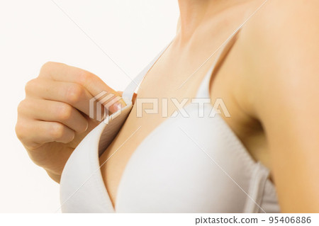 Female wearing too big bra Female wearing too big bra 95406886