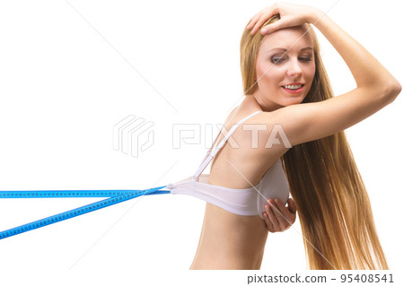 Woman wearing too big bra, loose band 95408541