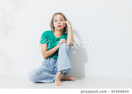 woman in green t-shirt woman in green t-shirt 95408644