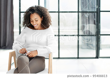 business woman reading correspondence on her smartphone. business woman reading correspondence on her smartphone. 95408813