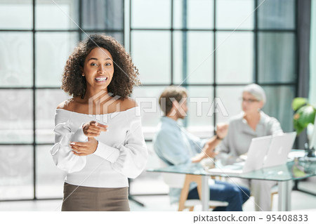 enthusiastic business woman standing in the office . enthusiastic business woman standing in the office . 95408833