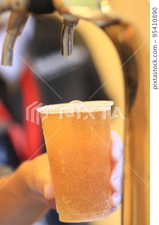 Beer poured from the tap, craft beer, draft beer Beer poured from the tap, craft beer, draft beer 95410890