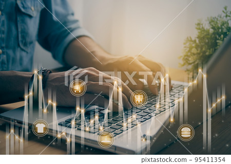 Casual Businessman Typing Laptop and Online Products Stock Market Bar Chart or Graph Trend in Vintage Tone Casual Businessman Typing Laptop and Online Products Stock Market Bar Chart or Graph Trend in Vintage Tone 95411354