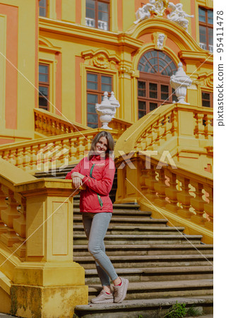 Beautiful Girl Posing Near Favorite Palace At Ludwigsburg, Germany. Favorite Castle Is The Oldest German Porcelain Castle Near The Village Of Forch Near Rastatt. Schloss Favorite, Baden-Wuerttemberg. 95411478
