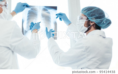 close up. medical colleagues discussing an x-ray of the lungs . 95414438