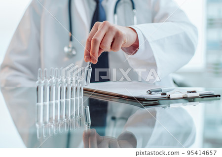 young scientist works in a clinical laboratory. 95414657