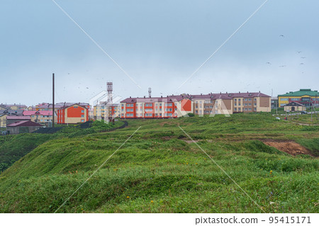 view of the town of Yuzhno-Kurilsk on the island of Kunashir view of the town of Yuzhno-Kurilsk on the island of Kunashir 95415171